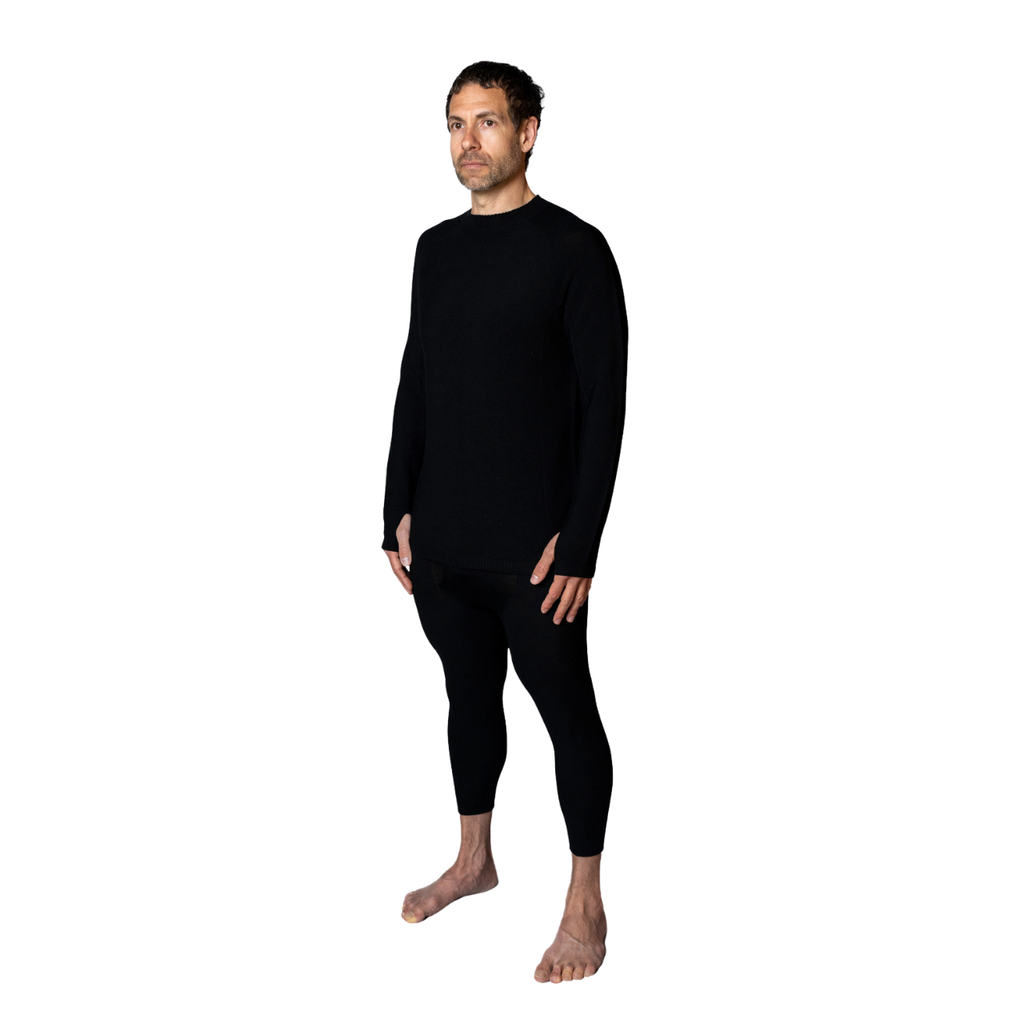 A man modeling a black long-sleeve crewneck shirt and matching black full-length pants against a plain white background. Skyline Baseline 3/4 Bottom